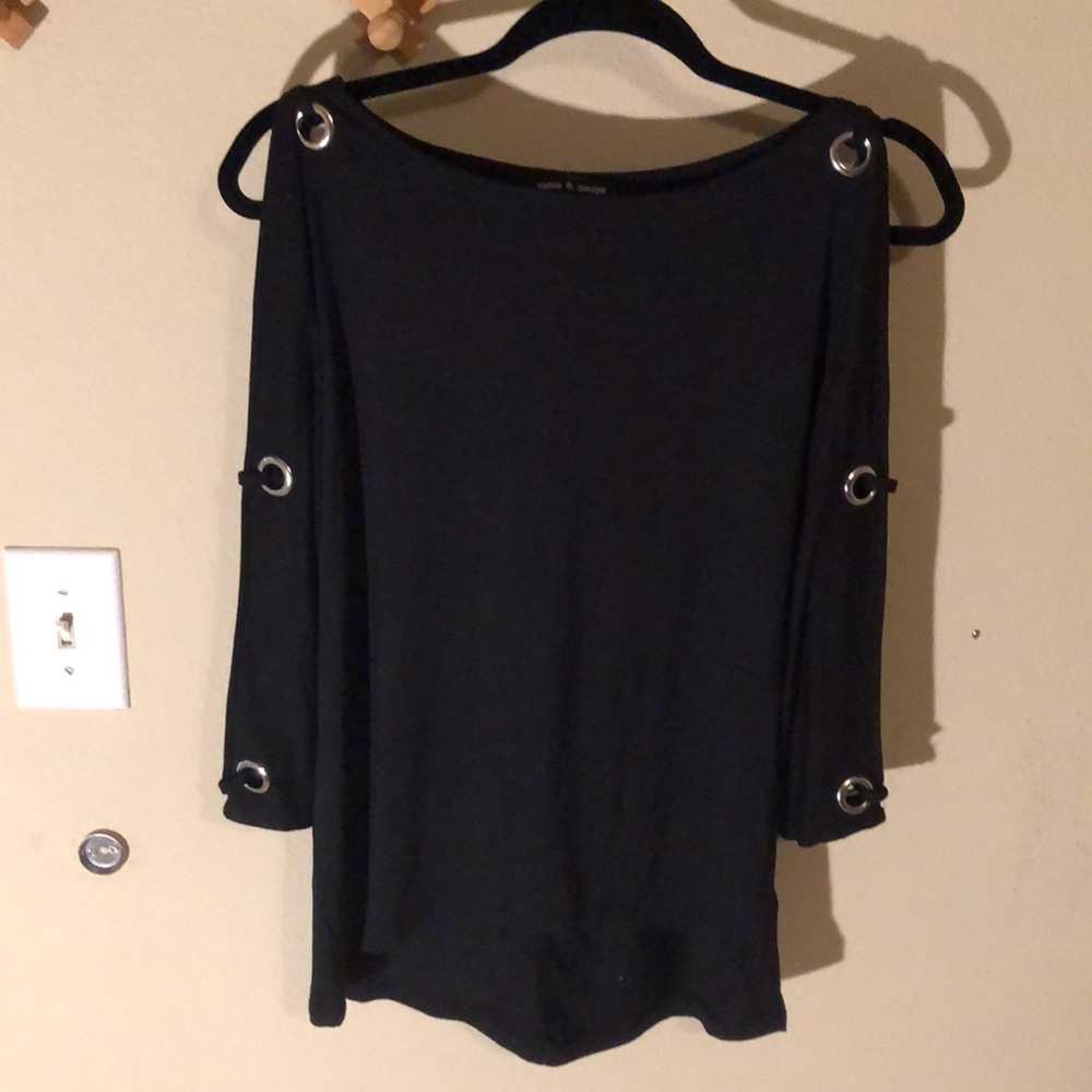 Cable and gauge grommet knit top